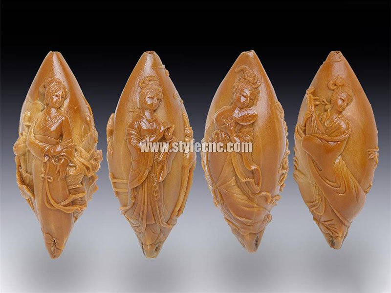 數(shù)控雕刻機(jī)對(duì)劣質(zhì)橄欖核進(jìn)行雕刻
