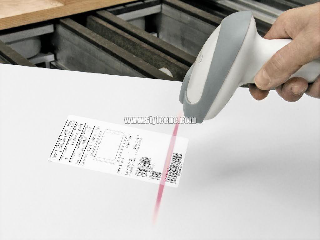 全智能數(shù)控雕刻機的自動條碼貼標(biāo)